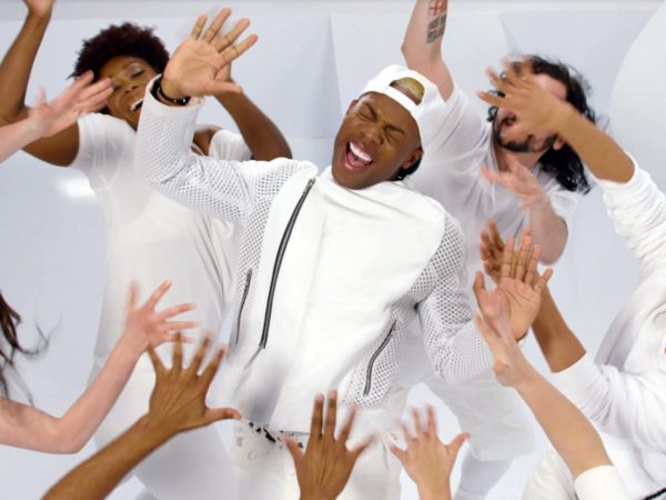 Todrick Hall singing and dancing with other dancers in an #HIVBeats video