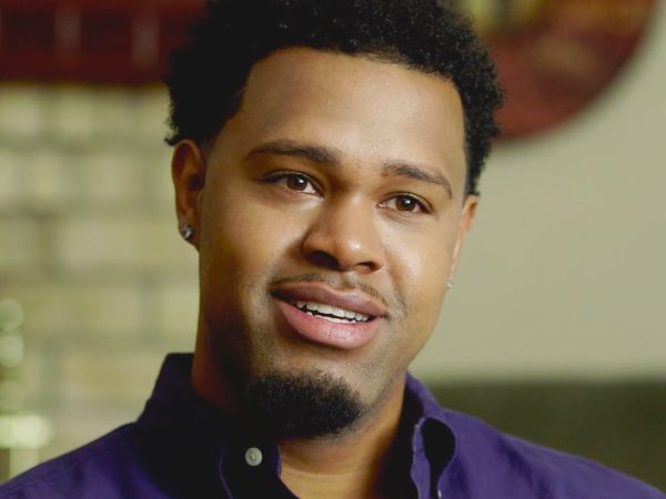 Close up shot of man talking to camera