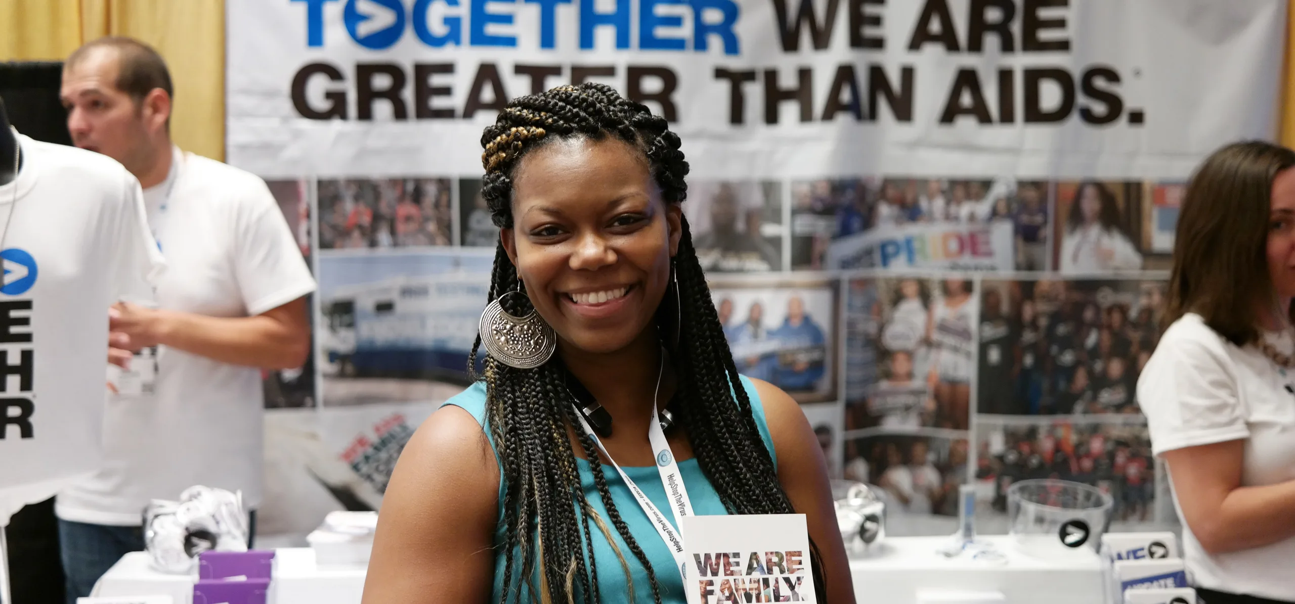 Smiling woman at Greater Than HIV at USCA 2016!
