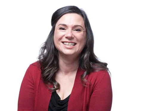 White woman smiling