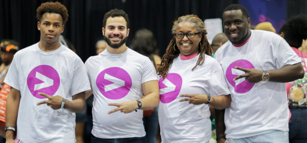 Group at the Greater Than HIV booth at #ESSENCEFEST