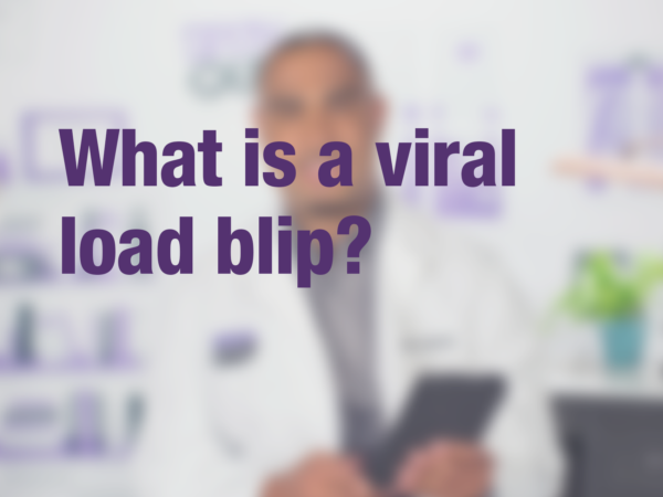 Graphic with purple text "What is a viral load blip?" with doctor in background
