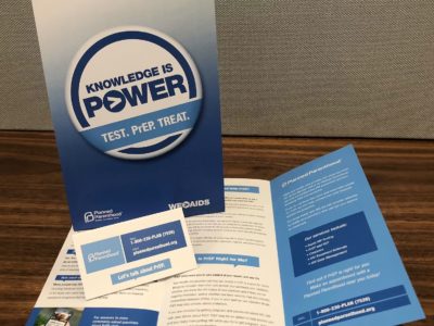 Photo of Knowledge is Power brochure on a table